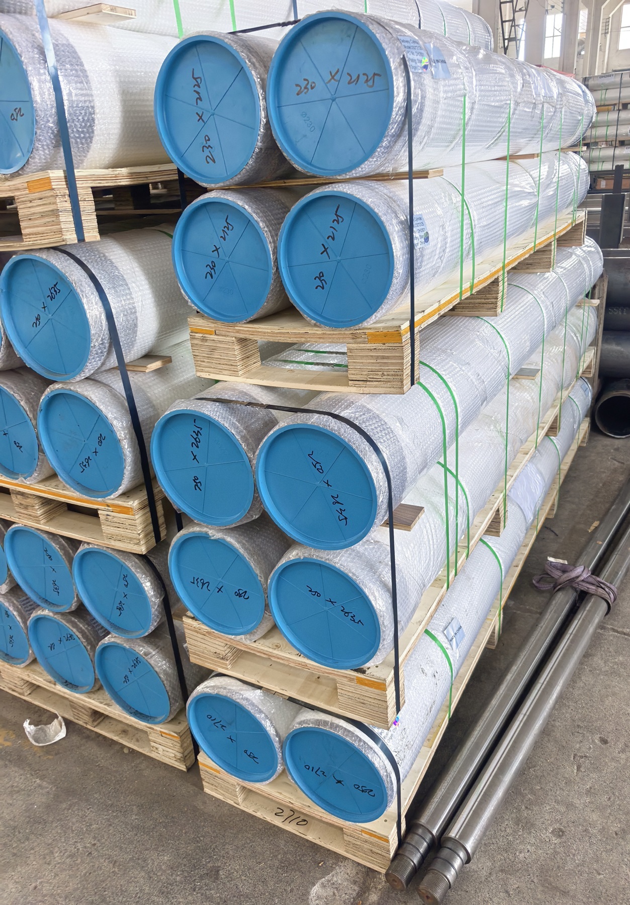 Concrete pump delivery cylinders prepared for export packing
