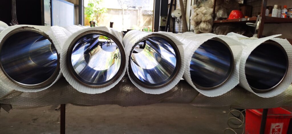 Finished bores of concrete pump delivery cylinders prepared for piston cup contact